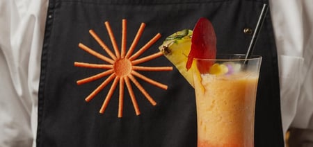 Waiter in the Hotel Lumen Lisboa serving a cocktail