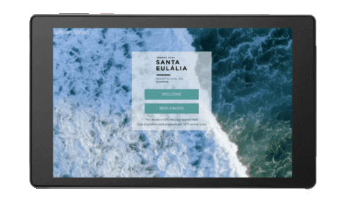 A branded SuitePad in-room tablet showcasing an animated splash screen design of a hotel customer