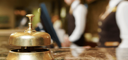 a service bell on top of the front desk 