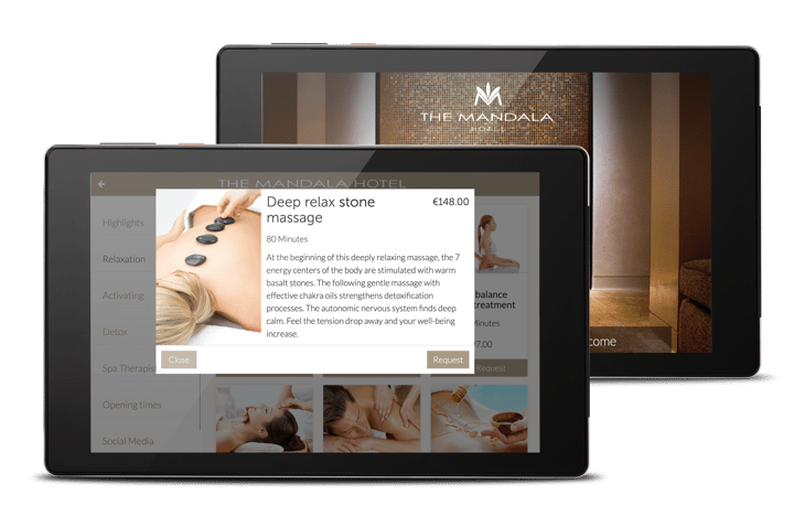 SuitePad in-room tablet displaying a spa treatment booking interface at The Mandala Hotel, including massage details and pricing