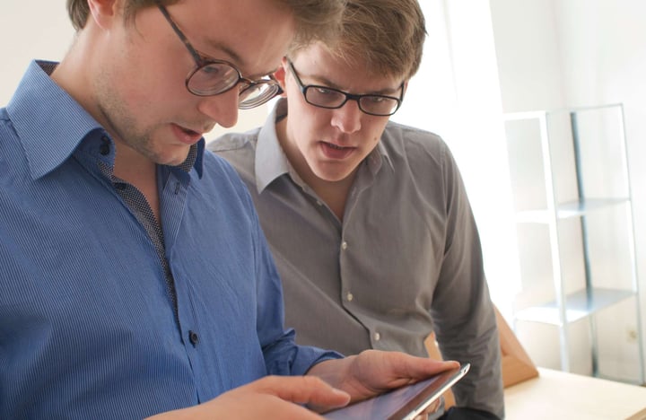 Moritz and Till looking at a SuitePad tablet in 2012