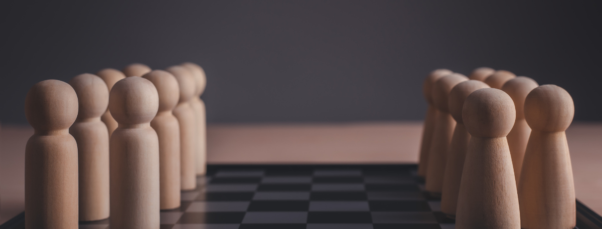 two wood coloured chain pieces facing each other