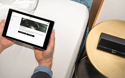 SuitePad tablet is used as a phone in the hotel room