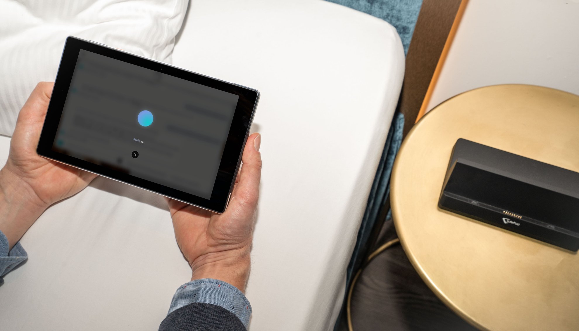 SuitePAd AI voice Assistant on the in-room tablet in a hotel room being used by a guest