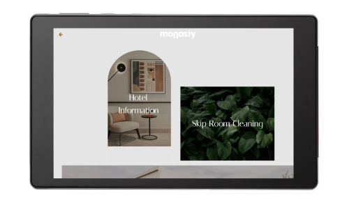 A branded SuitePad in-room tablet showcasing a custom homepage design of a hotel customer