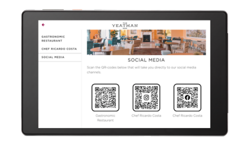 a mock up of SuitePad in-room tablets with the QR code feature