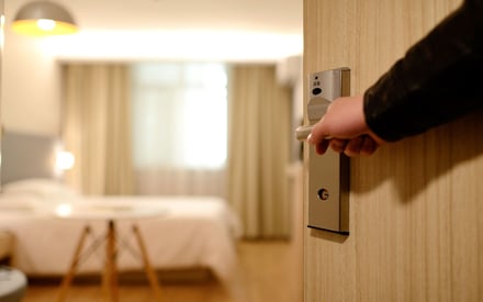 Person entering hotel room