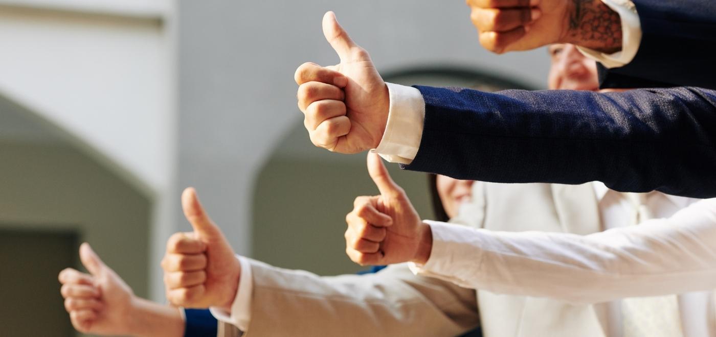 Hands showing thumbs up