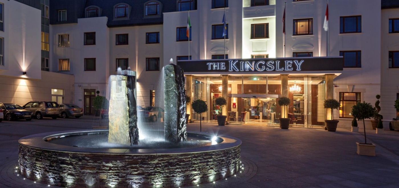 The entrance to the Kingsley hotel in Cork, Ireland at night.