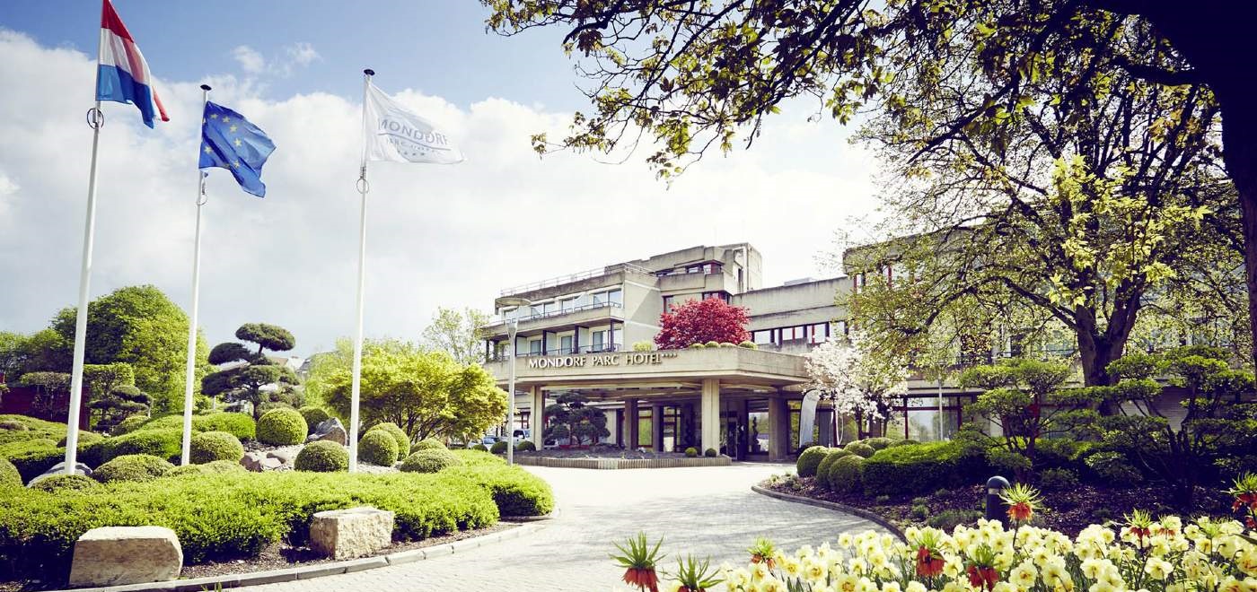 The entrance of the Mondorf Parc Hotel on a Sunny day..