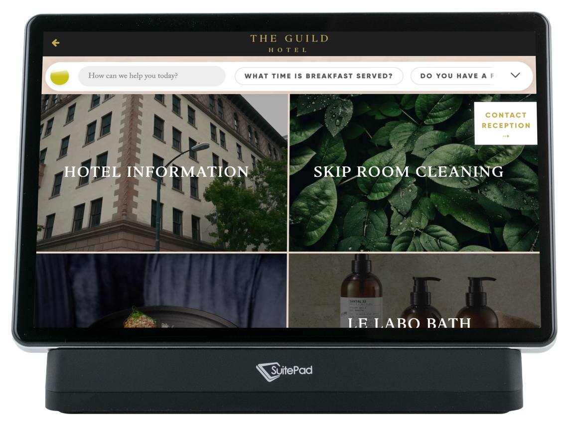 The Guild Hotel home screen on the SuitePad in-room tablet, showing hotel information and the option to skip room cleaning